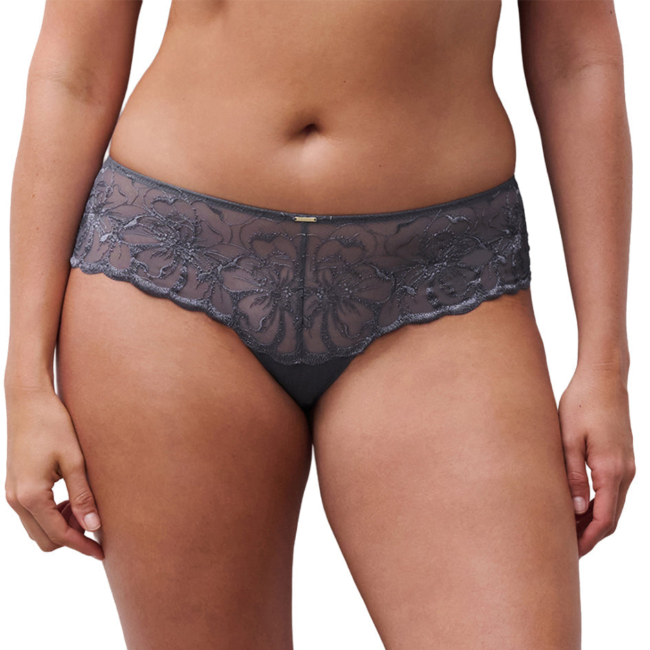 Lace bottom worn by a person on a white background